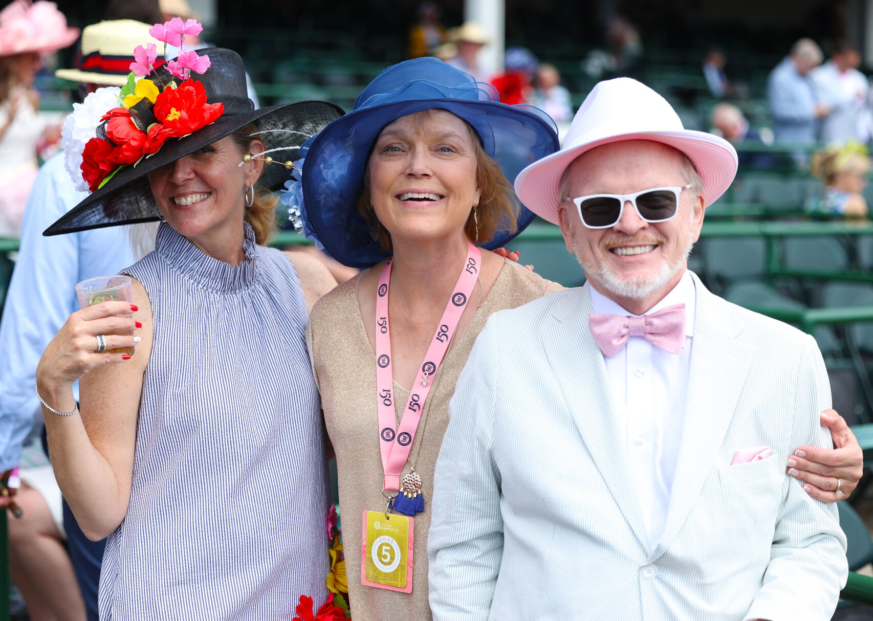 Three people pose for photos at Churchill.JPG